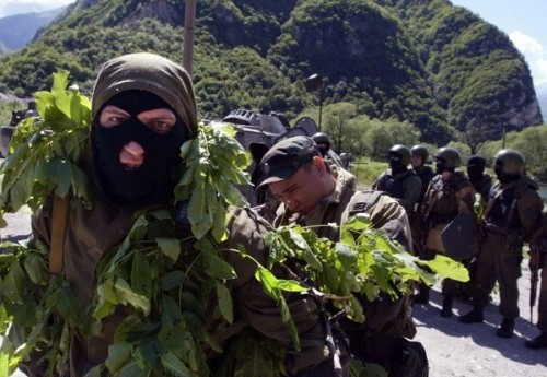 Russian Interior Ministry movable commandos have their military exercises near a border of South Ossetia and the restive southern Russian region of Ingushetia some 90 km outside Vladikavkaz on May 22, 2008.  Ingushetia, which neighbours Chechnya, frequently sees clashes between insurgents and Russian security forces. The local population share close ethnic ties and the Sunni branch of Islam with the Chechen people.AFP PHOTO / KAZBEK BASAYEV